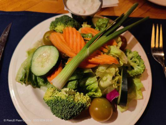 Dinner salad with housemade blue cheese dressing, colorful