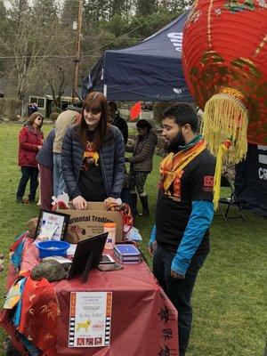 More donations at the Photo Booth check-in Table. Chinese lantern in the foreground