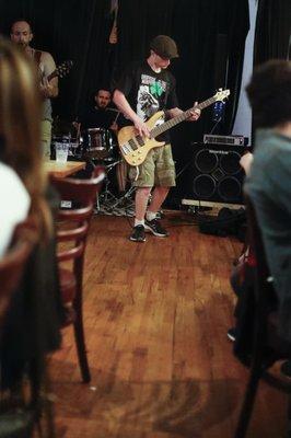 June 22, 2018:  The Other Place in Forest Hills . Rock band Oceania  deep rhythm Base guitar Devin Smith feeds  the crowds enthusiasm