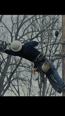 Haefele Technician hard at work installing Fiber.