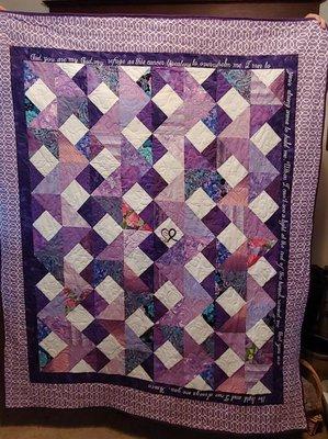 The quilt is a prayer quilt made for a lady battling lung cancer.