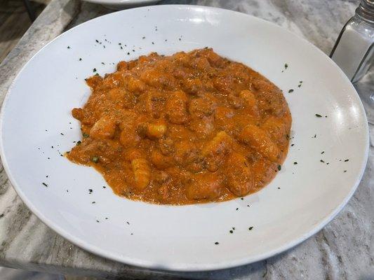 Homemade gnocchi in a bolognese sauce.