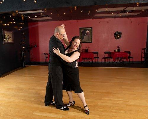 Dancing tango in Holiday Dance Studio's 3rd ballroom. We love their multiple spaces for dance!