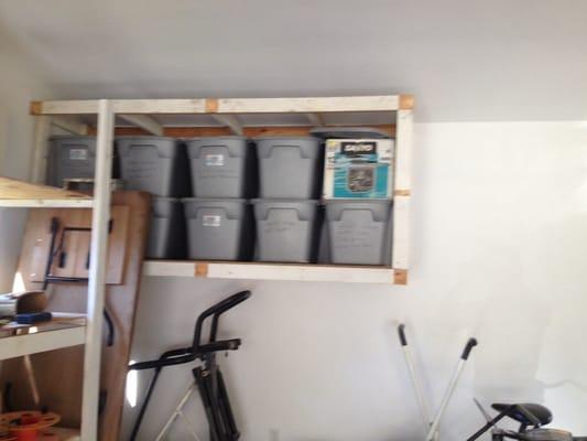 Garage remodel reuse shelving for custom cabinets.