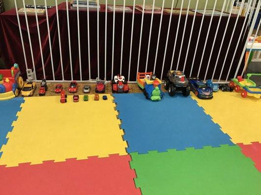 We have a large, safe, and fun play area inside with a variety of toys to play with.