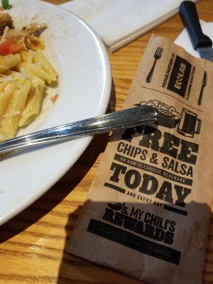 Not the chips and salsa mentioned on the flatware bag.