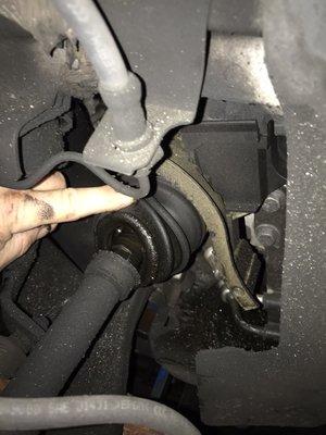 Our client was getting a "clicking" noise while turning. We uncovered a failed CV axle.