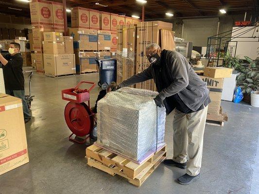 Michael securing the GE Monogram oven for safe & secure transport.