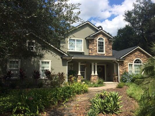 Pressure washed and painted the entire stucco exterior of this house as well as painted all of the trim.