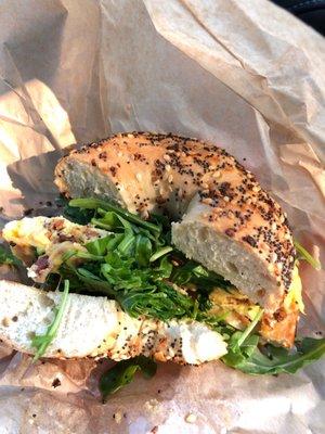 Breakfast sandwich on everything bagel with arugula added- delicious!