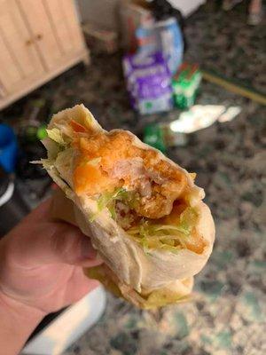 Raw chicken in burrito