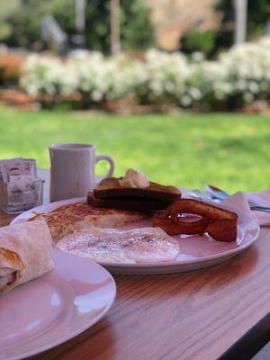 Thelma's breakfast with white roses outside.