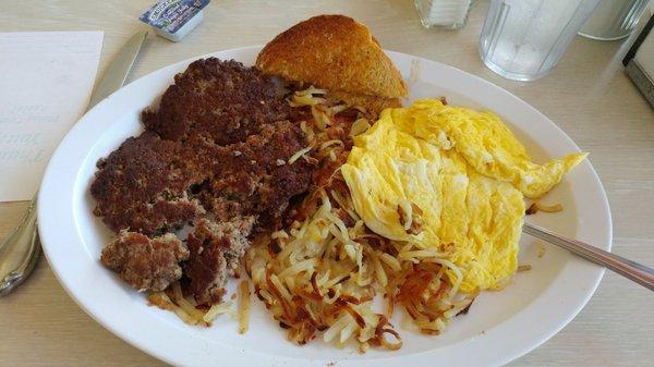 Hamburger steak and eggs. Generous portion of hamburger. $6.50