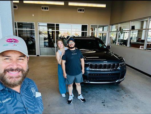 Hector with us next to our new Jeep