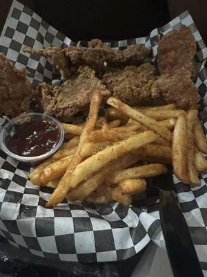 Fried ribs with fries tossed in Addy seasoning