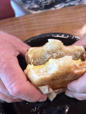 Sausage breakfast sandwich on English muffin