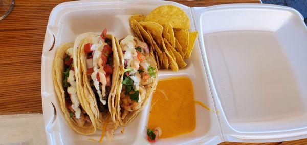 Steak, chicken, and shrimp taco.