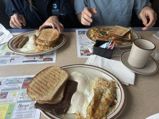 Shredded potatoes, 2 eggs, scrapple, rye toasted,