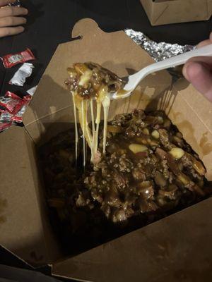 The Bacon Double Cheeseburger Poutine has some serious cheese pull