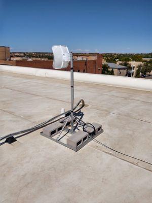 A non-penetrating mount on a flat roof