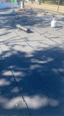 Low slope roofing system installation