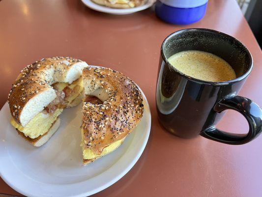 Breakfast sandwich w bacon, golden milk latte