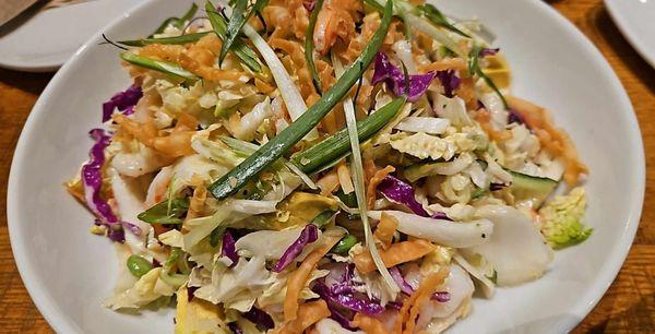 Shrimp, napa & red cabbage, avocado, cucumber, edamame tossed in our honey-miso dressing, crispy wonton straps & scallions.