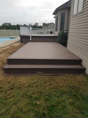 Wellsville, PA - Completed Azek composite deck.  Including all supports, decking and rail systems.