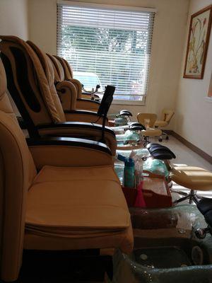 Comfortable massaging chairs for your pedicure needs.