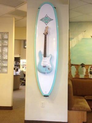 It's a rock & roll office. Surf's up!