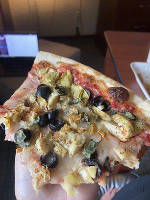 Veggie pizza with olives, artichoke, garlic