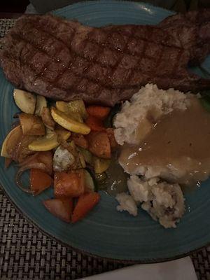 Ribeye with mashed potatoes and veggies