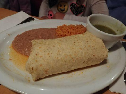 Chicken burrito with rice beans and avocado inside. $16