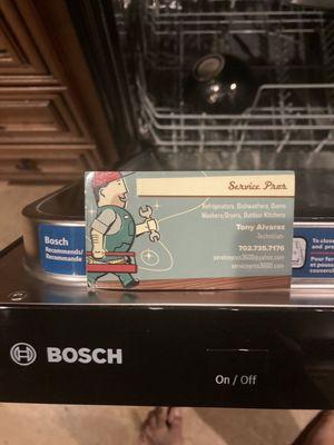 Business card and broken dishwasher