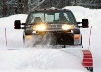 Snow Services-- including plowing, shoveling, salting/sanding, bobcat restacking, hauling/removal