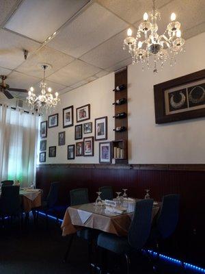 Beautiful chandeliers but water stained ceiling tiles need to be replaced.