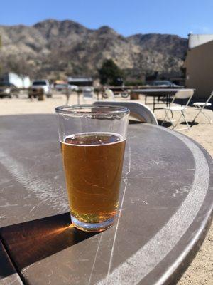 Enjoying a frosty beverage in the fresh mountain air.