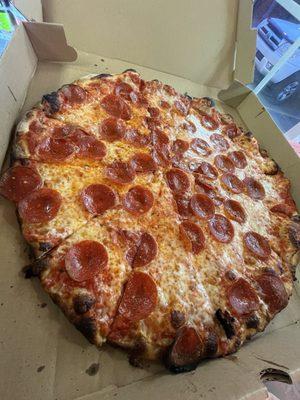 Large pepperoni cooked perfectly, delicious char.