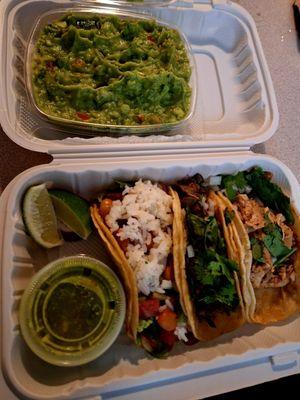 Veggie taco (rice and beans), birria taco, pollo taco, and guacamole.