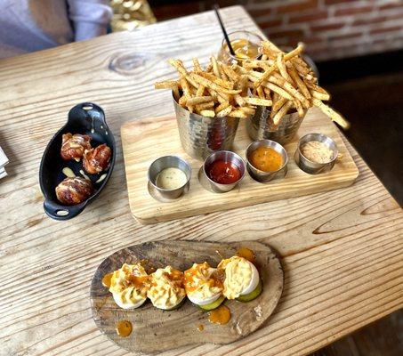 Deviled eggs, stuffed shrimp, parmesan fries with dipping sauces