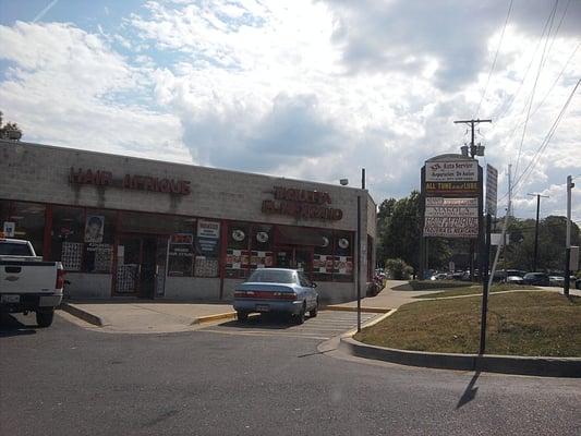 Storefront at end of strip mall