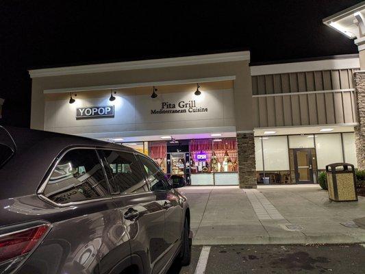 Outside. Storefront. Same shopping center as Food Lion on Weaver Dairy Road.