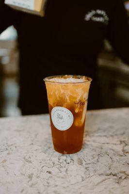 Cold Brew organic Thai Tea sweetened with our own organic raw cane sugar simple syrup, topped with a splash of cream.