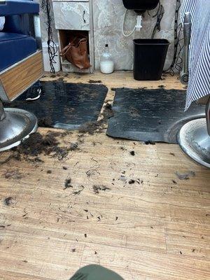 This is how the floor was when we walked in with no customers in the chair.