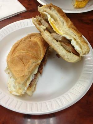 Egg, sausage and Swiss cheese on a roll