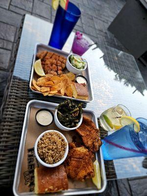 Catfish, collards greens, dirty rice, cucumber salad, chips