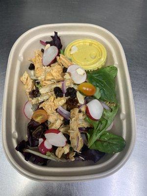 Cinnamon roasted pulled chicken  with dates , raisins ,almonds, mixed salad with house made three  pepper dressing .