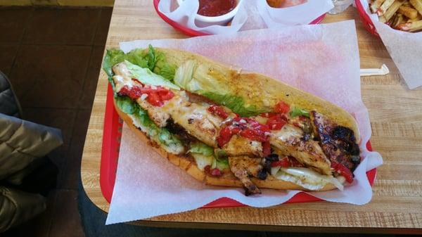 Newburg chicken on a hoagie roll with bacon