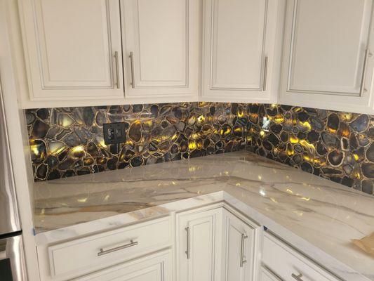 LED backlighting for onyx backsplash.