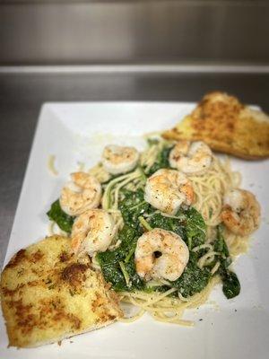 Shrimp Scampi pasta with spinach and garlic bread